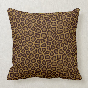 Fliesenhintergrund mit einem Leopardpelz Kissen