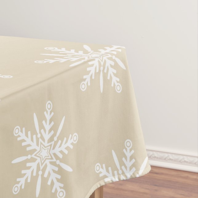 Flocons de neige blancs sur la nappe beige de Noël (In Situ)