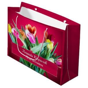Florale Business Packung farbige Tulpen auf rot Große Geschenktüte