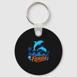 Florida-Delfine spielen mit Meereswellen Design Schlüsselanhänger