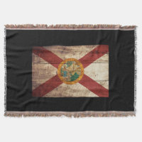 Florida-Staats-Flagge auf altem hölzernem Korn