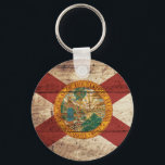 Florida Staatsflagge auf Altholzkorn Schlüsselanhänger<br><div class="desc">Sie können das Design nach Ihren Wünschen anpassen. Sie können den Designstandort,  die Ausrichtung,  die Hintergrundfarben und die Größe ändern. Außerdem können Sie Ihren eigenen Text,  oder Slogan Set seinen Schriftart,  Ort und Größe hinzufügen,  um das ultimative persönliche Geschenk für Sie und Ihre Lieben zu schaffen.</div>