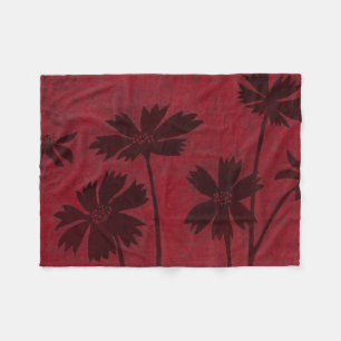 Flowerhead Silhouetten auf hochrotem Hintergrund Fleecedecke