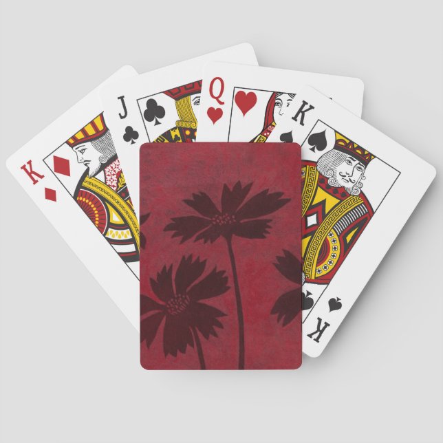 Flowerhead Silhouettes on Crimson Background Spielkarten (Rückseite)