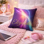 Flowing Waves of Color Kissen<br><div class="desc">Make a bold and beautiful statement with this personalized light wave accent pillow, designed to capture movement, energy, and individuality. Featuring flowing waves of radiant color—blending purples, pinks, blues, and golden light—this design creates a mesmerizing sense of motion against a deep, cosmic-inspired background. The elegant gold script name adds a...</div>