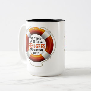 Flüchtlinge begrüßen große Tasse