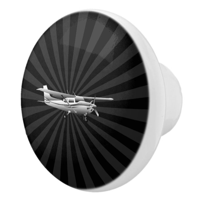 Flugzeug-Cessna-Silhouette, die schwarzen Keramikknauf (Rechts)