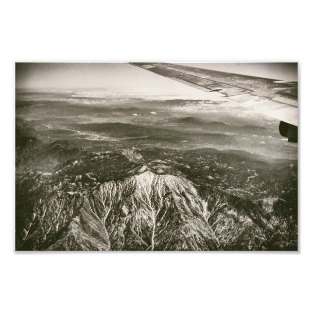 Flugzeug über schneebedeckte Berge Fotodruck (Vorne)