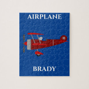 Flugzeugpuzzle mit personalisiertem Namen.