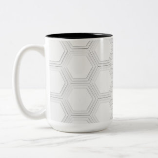 Fluid Symmetry: Erforschung abstrakter Designs im  Zweifarbige Tasse