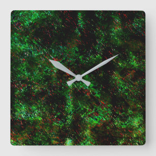 Fluktuation von dunklen Flecken auf leuchtend grün Quadratische Wanduhr