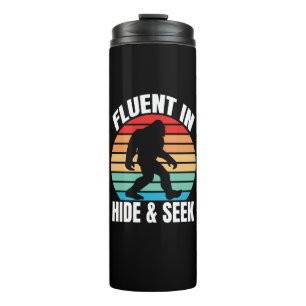 Fluor in Hide und Seek Funny Bigfoot Thermosbecher