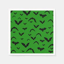 Flying bats on green serviette