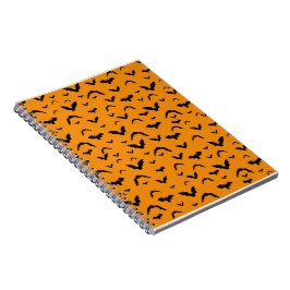 Flying Bats on Orange Notizblock