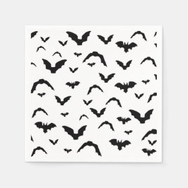 Flying bats on white serviette