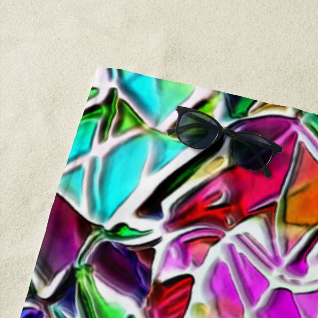 Form von farbigen und glänzenden Steinen in Milch  Strandtuch (Beispiel)