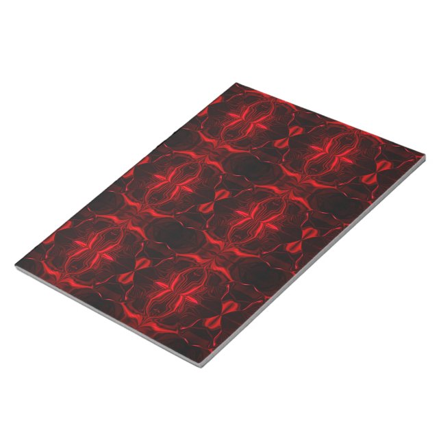 Formas em vermelho 'flutuando' sobre fundo preto. notizblock (angewinkelt)