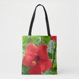 Foto aus rotem tropischem Hibiskus Blume auf einer Tasche