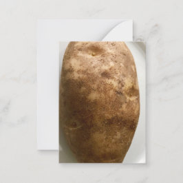 Foto einer Russet-Kartoffel auf einem weißen Telle Mitteilungskarte
