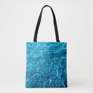 Foto eines makro sprudelnden blauen klaren Wassers Tasche