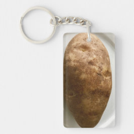 Foto von Russet-Kartoffel auf weißem Teller Schlüsselanhänger