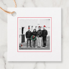 Foto Weihnachtsmannmützen für Familienurlaub Frohe Geschenkanhänger