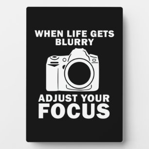 Fotograf passt Ihren Fokus an Fotoplatte
