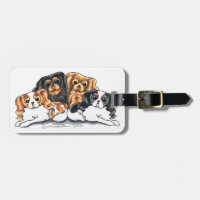 Four Cavalier King Charles Spaniels