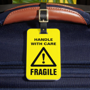 Fragile Handle mit vorsichtigem gelben Warnzeichen Gepäckanhänger
