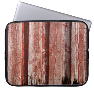 Fragment einer alten bemalten Holzwand. Hintergrun Laptopschutzhülle