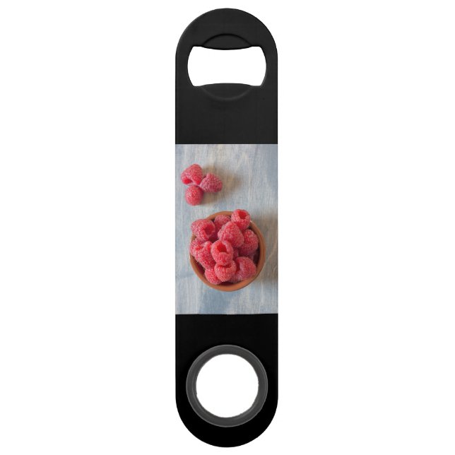 Framboises fraîches dans un bol (Dos)