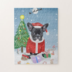 Französischer Bulldog im Schnee mit Weihnachtsgesc