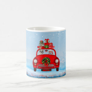 Französischer Bulldog in Auto mit dem Weihnachtsma Kaffeetasse