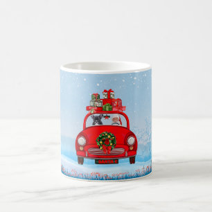 Französischer Bulldog in Auto mit dem Weihnachtsma Kaffeetasse