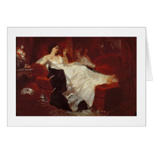 Frau auf einem roten Sofa