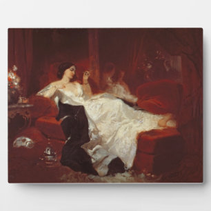 Frau auf einem roten Sofa Fotoplatte
