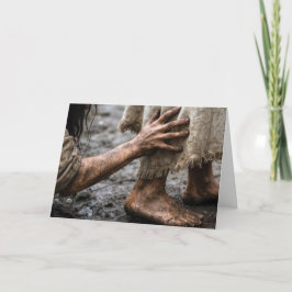 Frau greift nach Jesus Karte
