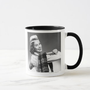 Frau mit Kappe Tasse