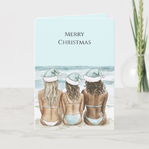 Frauen in Weihnachtsmannhüten am Strand Weihnachte Karte