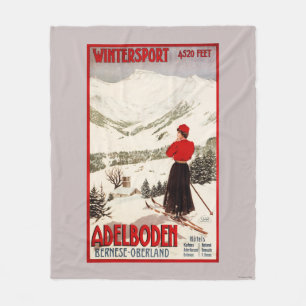 Frauen-Skifahrer, der Adelboden-Plakat übersieht Fleecedecke