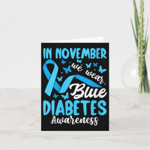 Frauen tragen im November blaues Diabetes-Bewussts Karte
