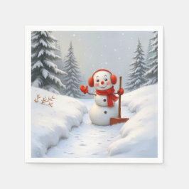 Freundlicher Schneemann mit einer roten Schaufel Serviette