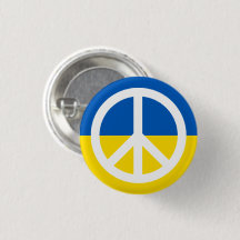 Friedenssymbol mit ukrainischer Flagge gegen den K