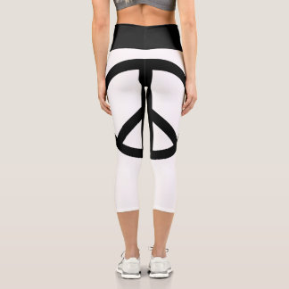 Friedenszeichen mit Drehung Hochgebranntes Riff Capri Leggings