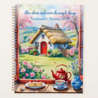 Friedliche Hütte mit Tee und Blume Planer