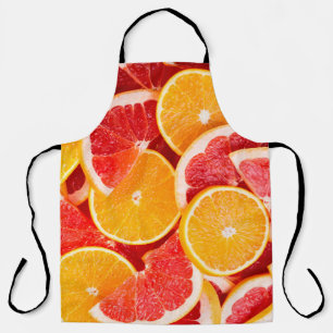 Frische reife Orange- und Grapefruituntergrund Schürze
