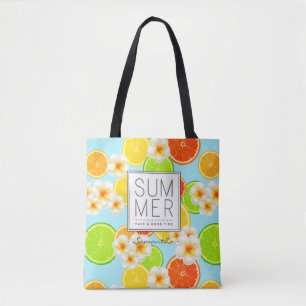 Frisches Sommerobst und exotische Plumeria-Blume Tasche