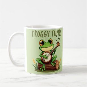 Froggy Tunes: Bezaubernder Cartoon-Frosch spielt B Kaffeetasse