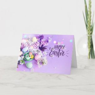 Frohe Ostern Süße Blume und Eier auf Lila  Karte