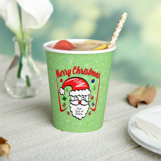 Frohe Weihnachten 20xx Weihnachtsmann mit Hut und  Pappbecher (In Situ)
